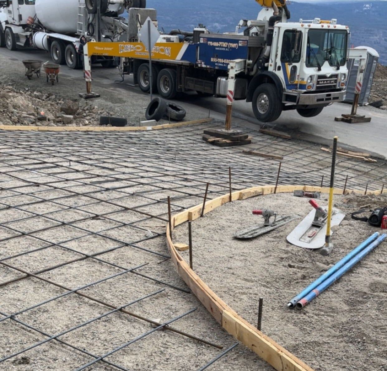 Forms and rebar set with a pump truck