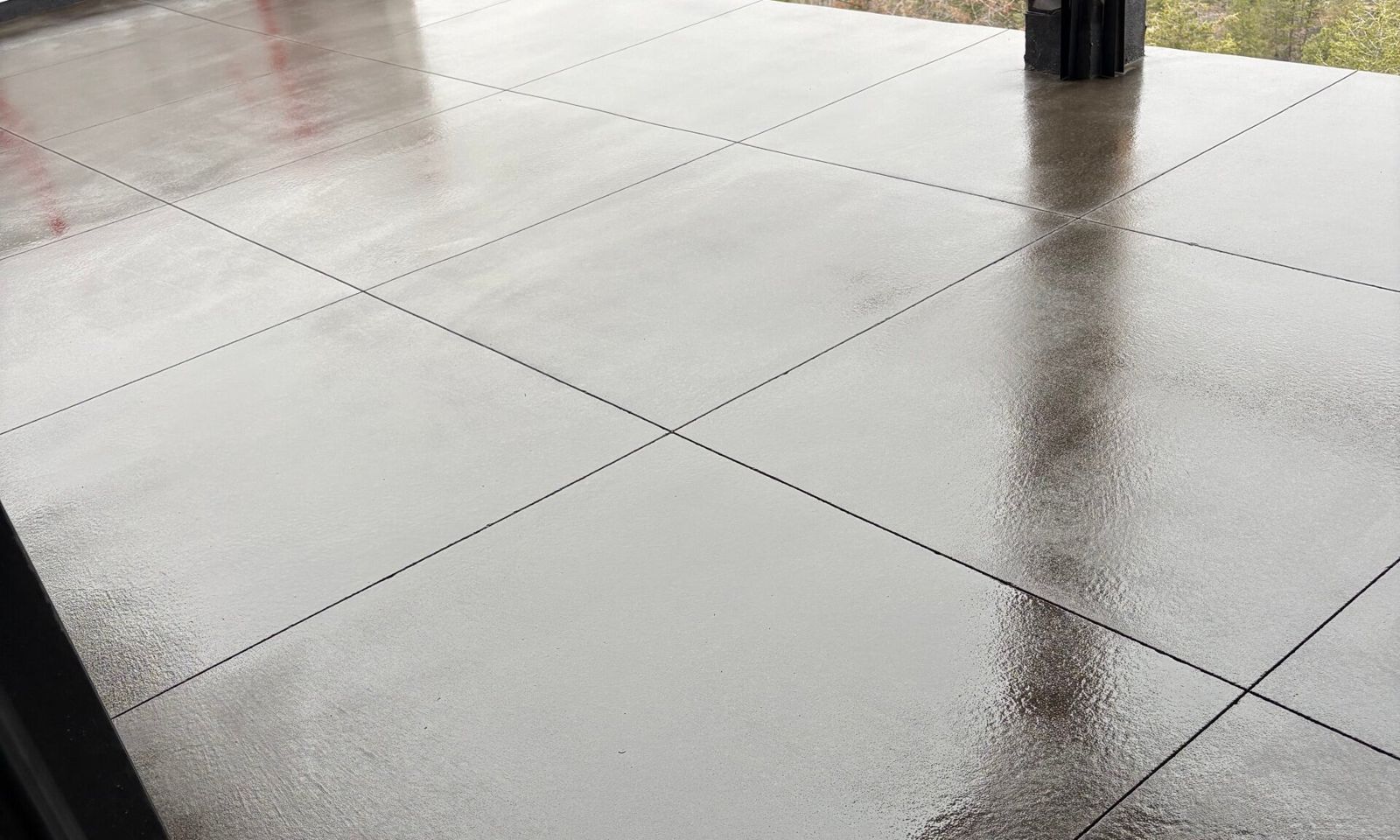 Glossy sealed concrete surface